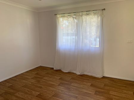 Sunny Four Bedroom Home - Photo 4