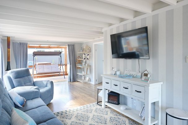 Modern Beachside Living - 3-Bedroom Home in Waikuku Beach - Photo 1