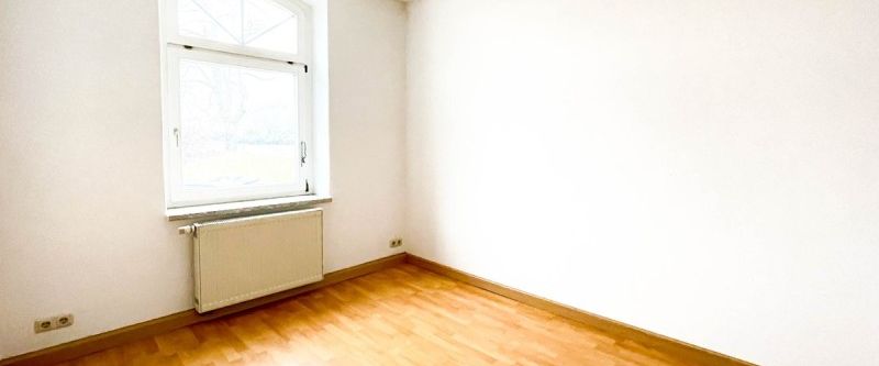 Gemütliche Erdgeschosswohnung im Herzen von Grünhain - Photo 1