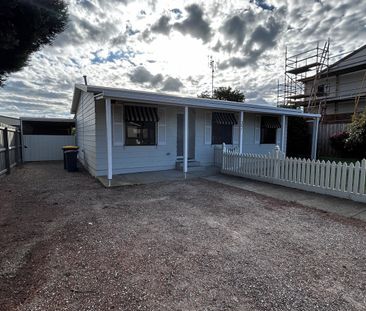 Freshly Painted, Neat Home in Fantastic Drysdale Location - Photo 6