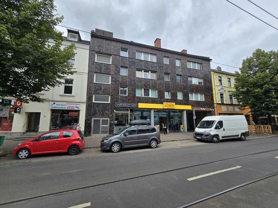 Sanierte Wohnung in Düsseldorf-Eller, direkt in der Einkaufsstraße - Foto 1