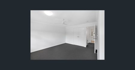 Spacious Two-Bedroom Townhouse in Convenient Location - Photo 3