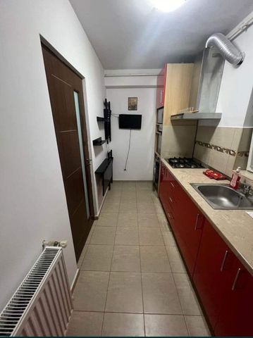 Garsoniera bine compartimentata cu balcon inchis, centrala termica - Fotografie 4