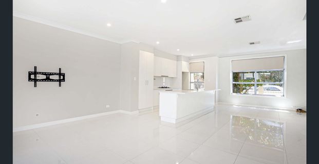 Modern, Spacious & Low Maintenance - Photo 1