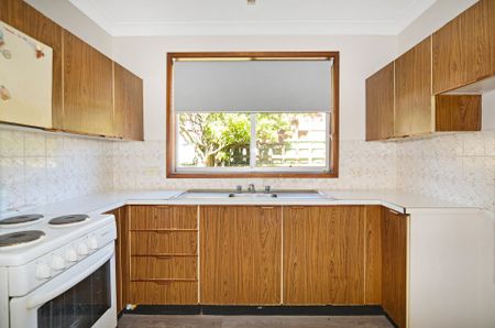 CONVENIENTLY LOCATED TWO BEDROOM VILLA - Photo 3