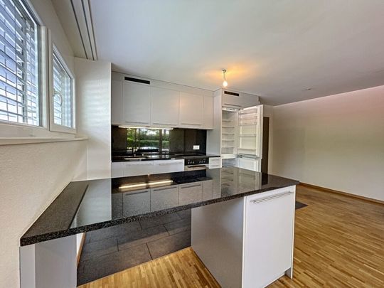 Bel appartement de 2,5 pièces au rez-de-chaussée - Photo 1