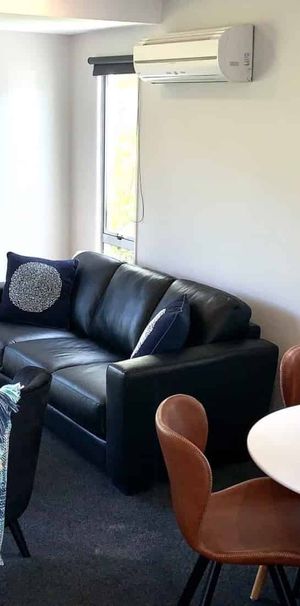 Fully Furnished 2 - 3 Bedroom City Townhouse with Internal Access Garage! - Photo 1