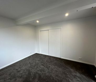 Tastefully renovated three bedroom home - Photo 2