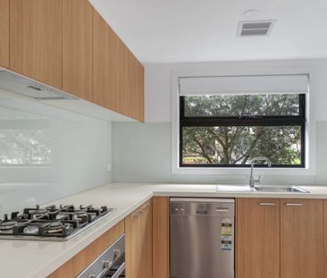 Stylish Two-Bedroom Townhouse - Photo 1