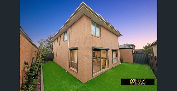 Move-In Ready! Stunning 4-Bedroom Family Home in Grove Estate! - Photo 1