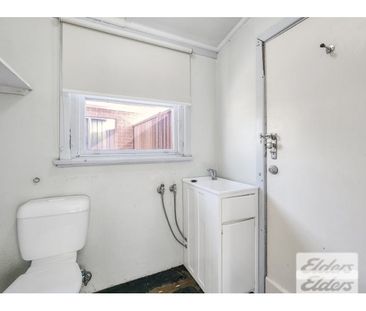 Spacious 2-Bedroom Duplex in Convenient Location - Photo 2