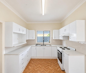 Comfortable Single-Level Living with a Fully Fenced Yard - Photo 4