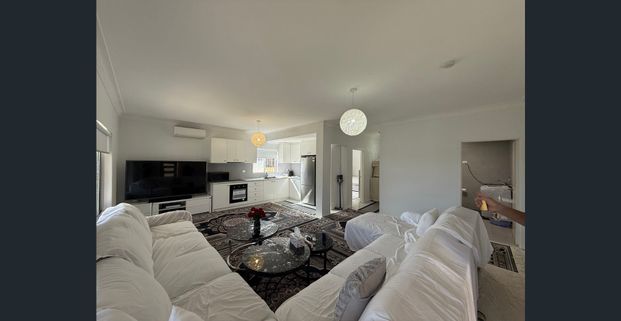 Modern Two Bedroom Home with Utilities Included - Photo 1