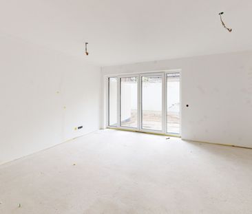 Exklusive 2-Zimmer-Neubauwohnung mit Terrasse und Garten in Niedrig... - Foto 1