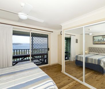 FULLY FURNISHED HOME WITH SPECTACULAR LAKE VIEWS - Photo 4