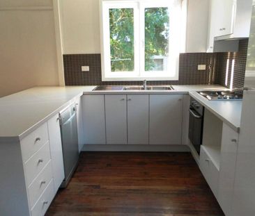 RENOVATED AND WELL LOCATED HOME - Photo 2