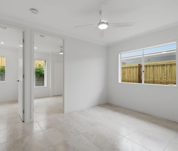 BRAND NEW FAMILY HOME WITH THREE LIVING AREAS! - Photo 3