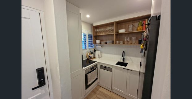 Coastal Home In The Heart of Chevron Island - Photo 1