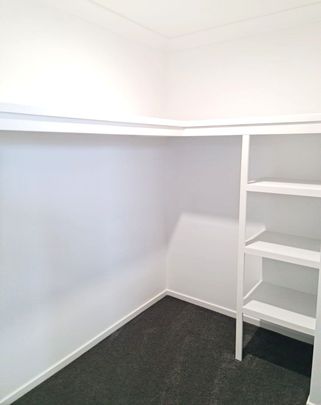 AVAILABLE 08/11/2025 - 4 BEDROOM- 2 BATHROOM FULLY DUCTED AIR-CONDITIONED TOWNHOUSE - Photo 1