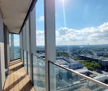 Wohnen mit Skyline-Flair – Rooftop Pool & Fitness bei der U1 - Photo 1