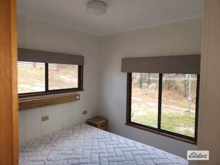 Charming Two-Bedroom Cabin with Stunning Mountain Views! - Photo 2