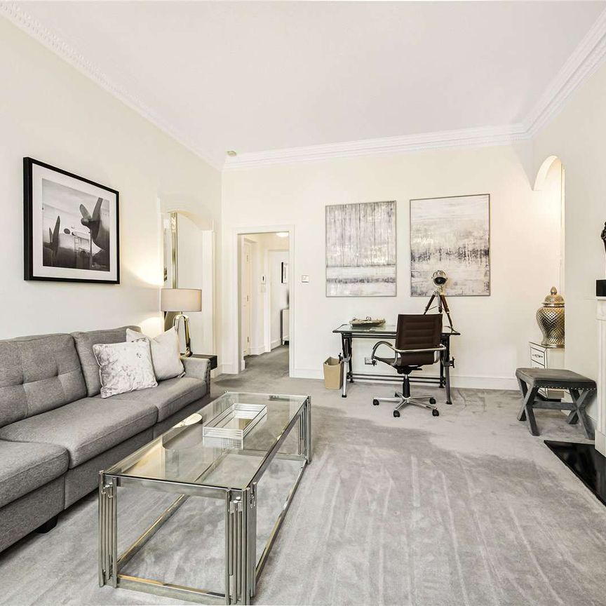 A beautifully presented first floor one bedroom apartment (with lift) in the heart of Knightsbridge neutrally decorated in contemporary style with superb storage throughout. - Photo 1