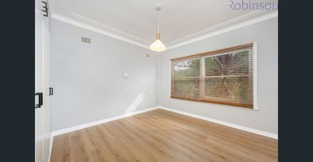 Three bedroom home with single garage, where the back yard lawn is mowed for you! - Photo 3