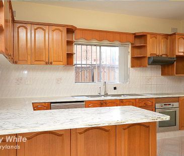 Spacious 3-Bedroom - Photo 4