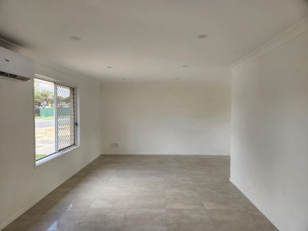 Fully Renovated Inside With Spaciousness in Mind - Photo 4