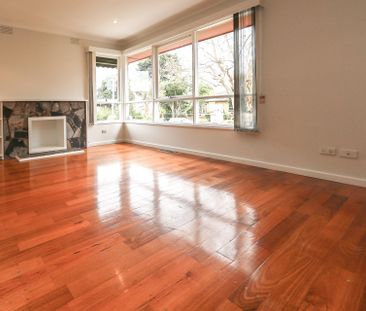 Bright & Beautiful Three-Bedroom Home - Photo 1
