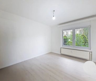 Lichtrijk gerenoveerd 3-slaapkamerappartement - Photo 3