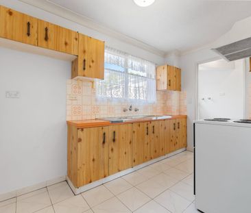 First-Floor Full Brick Two-Bedroom Unit with Single Garage! - Photo 5