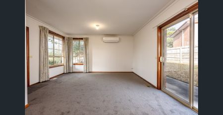 Stylish Two-Bedroom Unit with Private Garden & Easy Access to Amenities - Photo 2