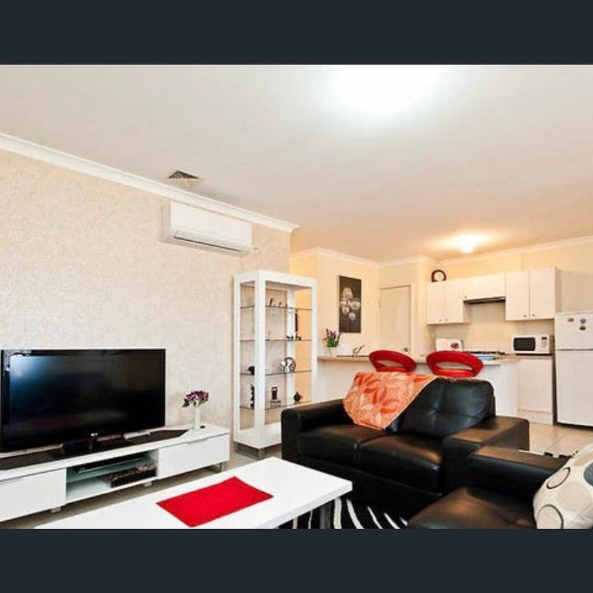 Walk to Carousel, Train Station and Leisure Center | Fully Furnished & Gated - Photo 1