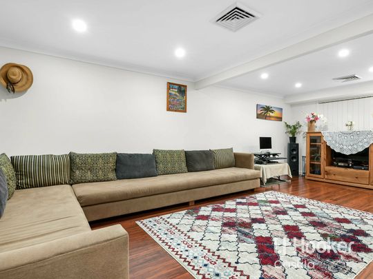 Impressive 5 Bedroom / 4 Living Zone Residence - Photo 1