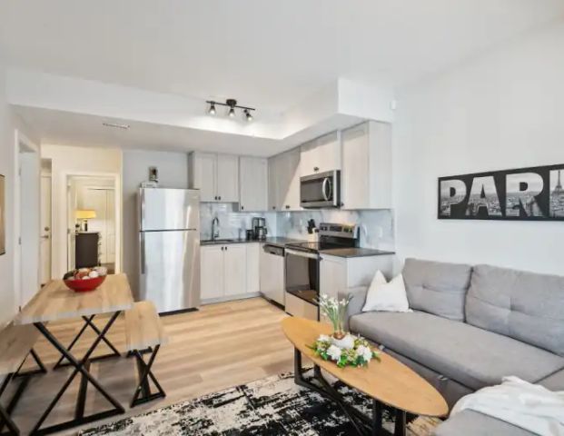 2 Bed Legal Basement suite - FULLY FURNISHED | Edith Row NW, Calgary - Photo 1