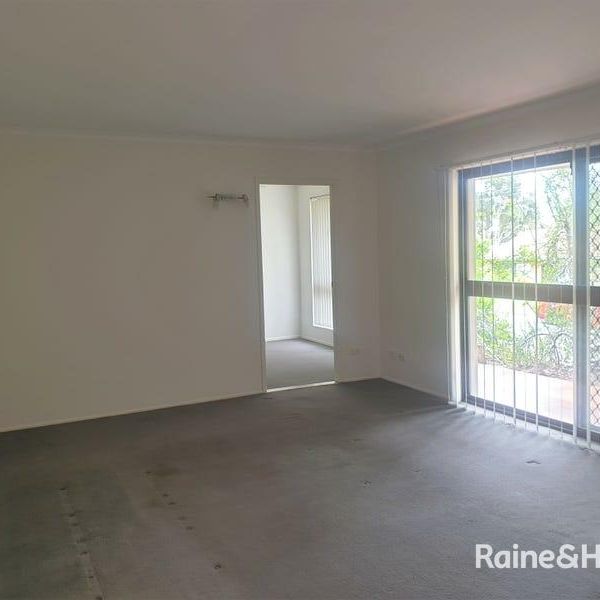 Family Home in the heart of Springwood - Photo 1