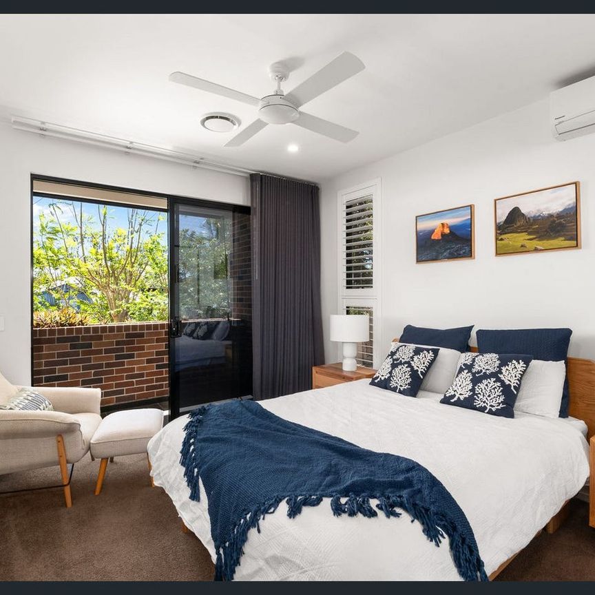 Striking Contemporary Tri-Level Oasis with Private Pool – Outdoor Maintenance Included - Photo 1