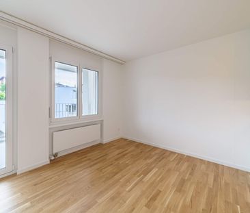 Moderne 2.5 Zimmer Wohnung im EG - Foto 1