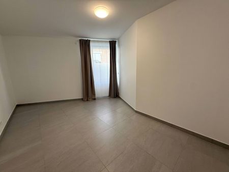 Nieuwbouwappartement met 3 slaapkamers, groot terras en autostaanplaats te huur in centrum Leuven - Photo 2