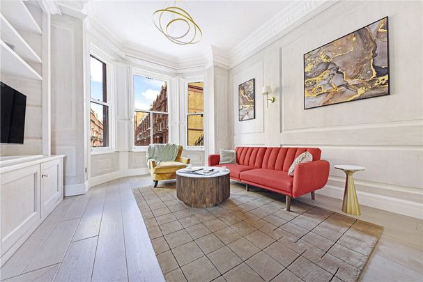 Immaculate and beautifully presented ground and lower ground floor duplex that has been refurbished to an exceptional standard combining the contemporary with the period features. Minimum Tenancy Length: 12 months EPC Rating C | Council Tax Band G - Photo 1