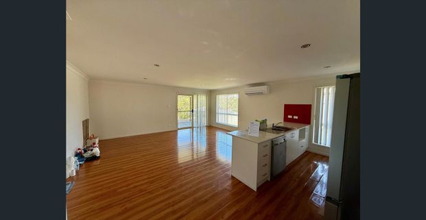 Modern 4-Bedroom Family Home - Photo 1