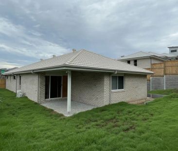 “Spacious Family Home in Collingwood Park” - Photo 1