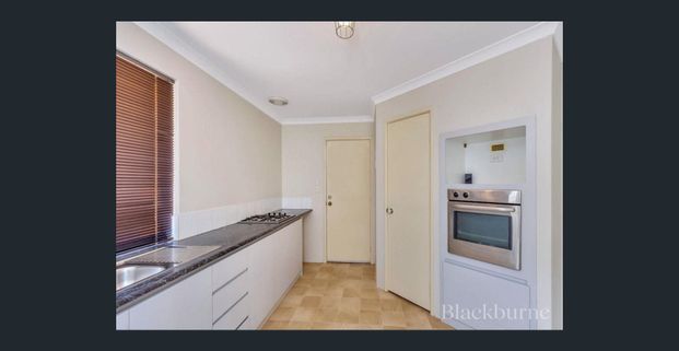 Charming Coastal Retreat in Port Kennedy - Photo 1