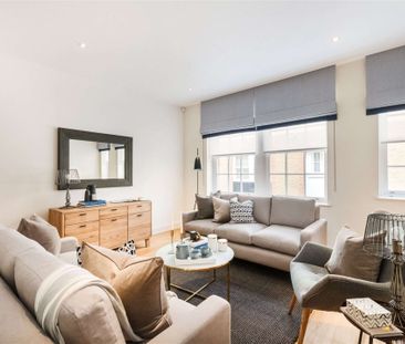 This spacious mews house situated within the gated development that... - Photo 2