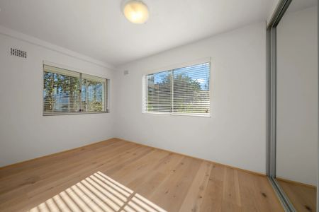 Exceptionally Renovated Two Bedroom Apartment within Walking Distance to Beach - Photo 3