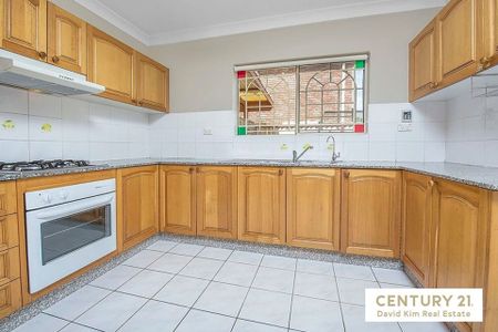 Secure & Bright Two Bedroom Townhouse with Double Garage - Photo 3