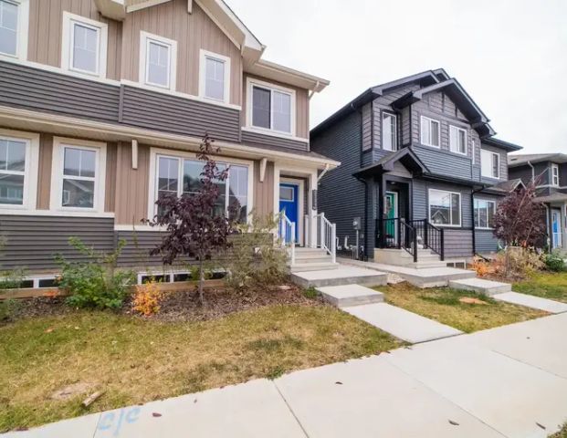 Duplexes in Orchards at Ellerslie | 2704-2766 Chokecherry Place SW, Edmonton - Photo 1