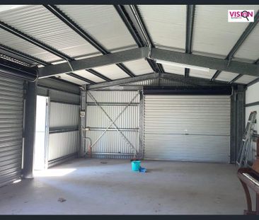 This neat and tidy low-set home offers comfortable coastal living i... - Photo 6