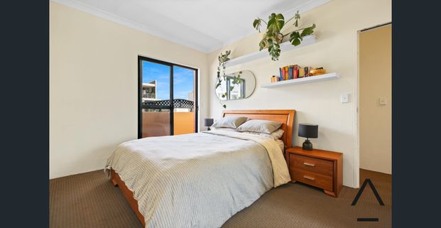 Centrally Situated, Private and Secure Penthouse — Three Bedroom, Two Bathroom Oasis in a Superb Location - Photo 1